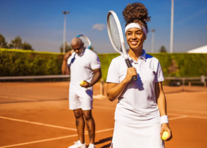 mana and woment playing tennis